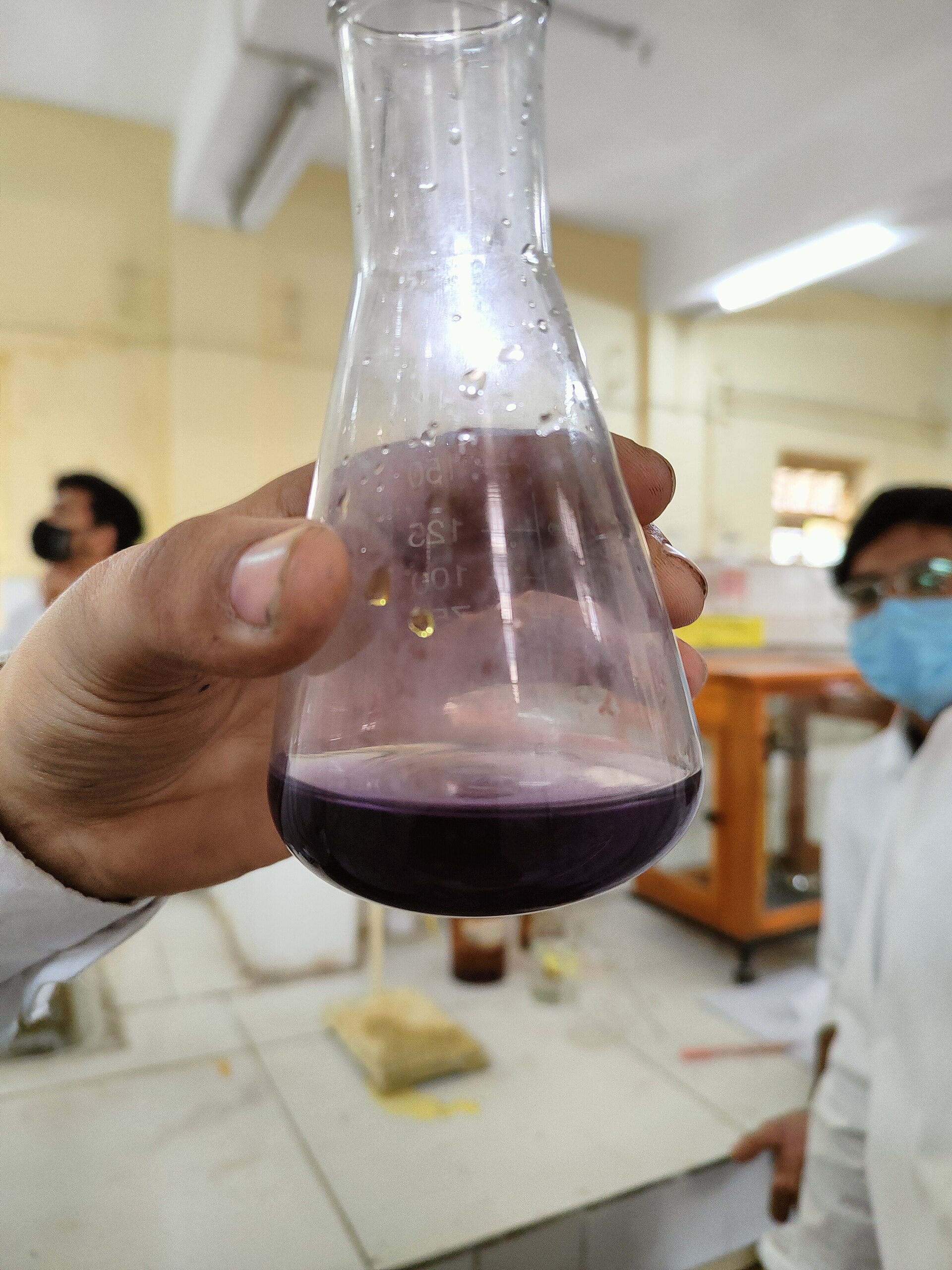 Conical flask during a potassium permanganate titration
